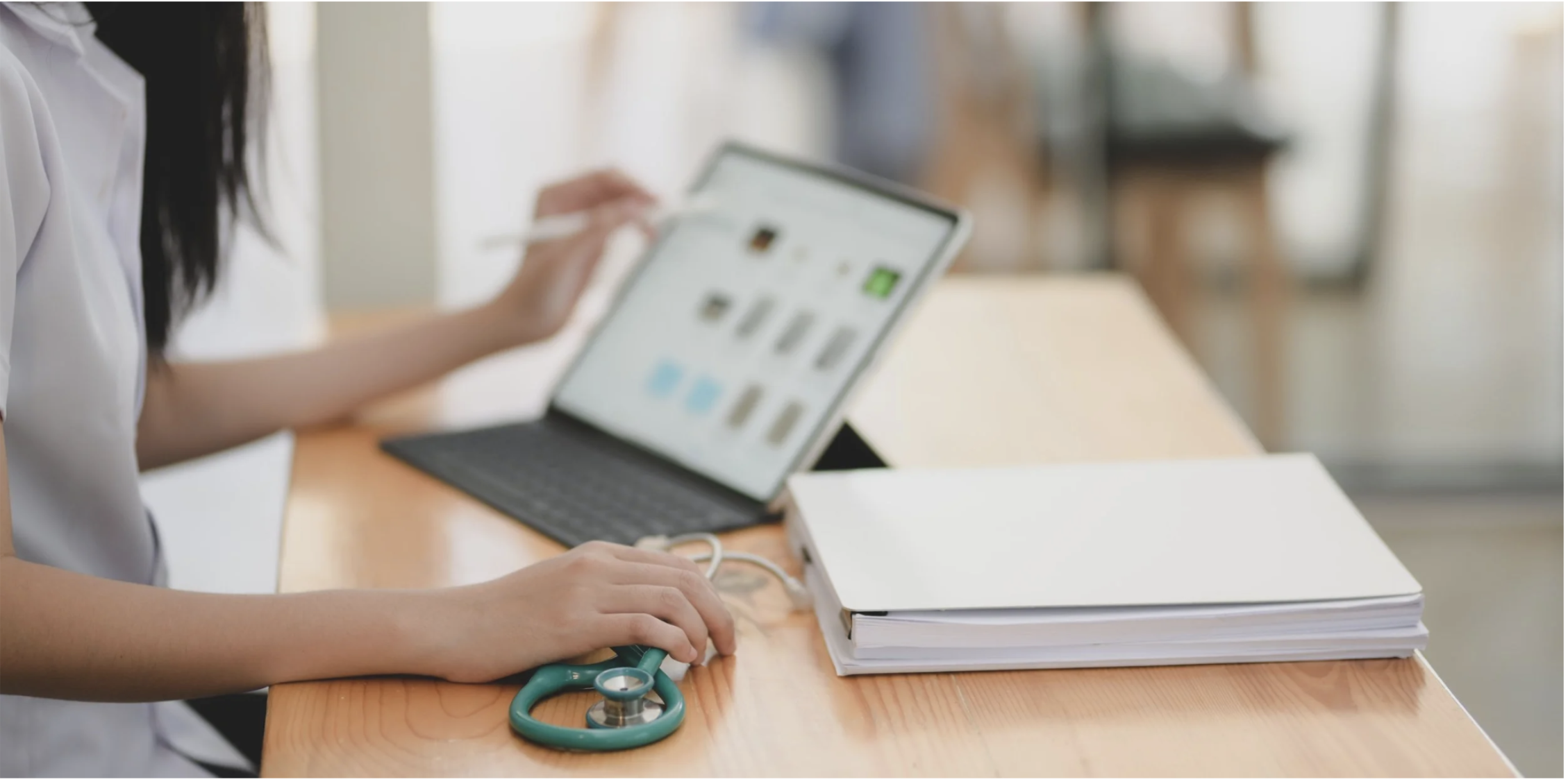 Healthcare professional at desk